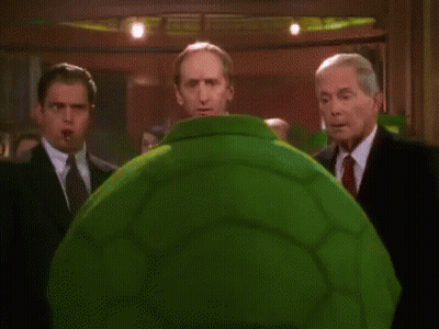 Bald Man In Green Suit Saying Hope It's As Fun As The Turtley Club GIF