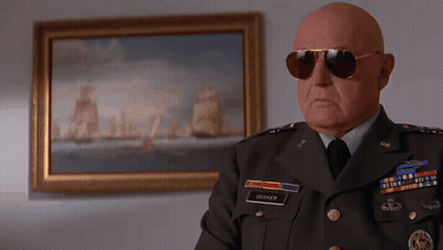 Bald Man In Military Uniform With Name Decker GIF