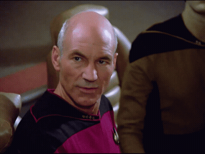 Bald Man In Pink And Black Uniform GIF