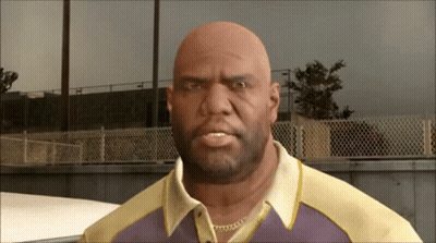 Bald Man In Purple And Yellow Shirt GIF