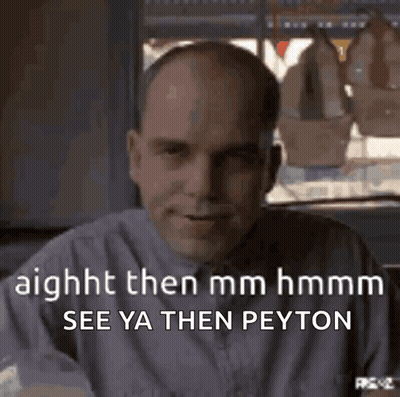 Bald Man In Purple Shirt Smiling Saying Aight Then Mm Hmm See Ya Then Peyton GIF