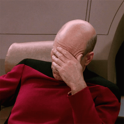 Bald Man In Red Shirt Covering Face GIF