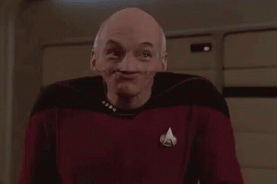 Bald Man In Red Shirt Making Funny Face GIF