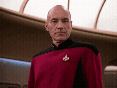 Bald Man in Red Star Trek Uniform