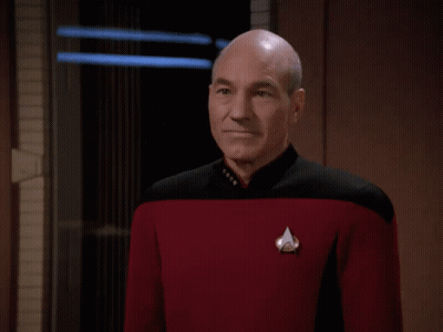 Bald Man In Red Uniform Saying Perhaps Not GIF