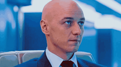 Bald Man In Suit And Tie Looking Left GIF