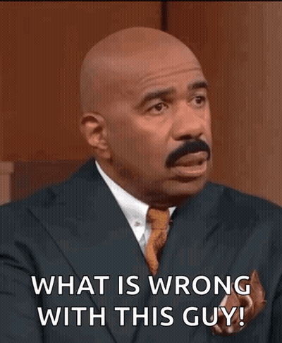 Bald Man In Suit Asking What's Wrong GIF