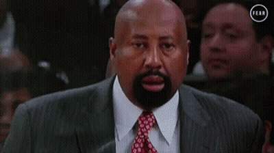 Bald Man In Suit Looking GIF