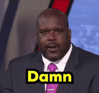 Bald Man In Suit Making Funny Face Saying Damn GIF