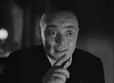 Bald Man In Suit Making Funny Face GIF