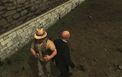 Bald Man In Suit Next To Man In Hat GIF