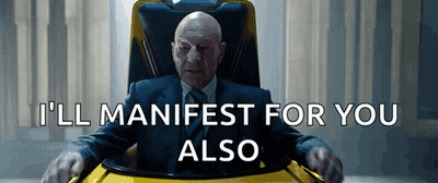 Bald Man In Suit Saying I'll Manifest For You Also GIF