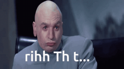 Bald Man In Suit Saying Rihhh Th T GIF