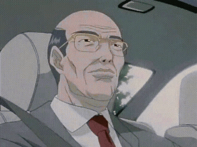 Bald Man In Suit Sitting In Car GIF