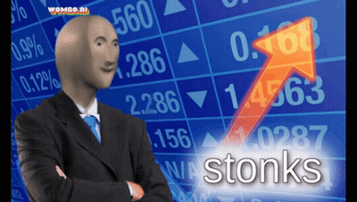 Bald Man In Suit Standing Before Stonks Chart GIF