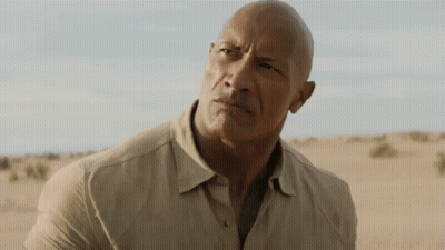 Bald Man In Tan Shirt Desert Mouth Open GIF