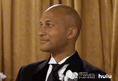 Bald Man In Tuxedo With Hulu Logo GIF