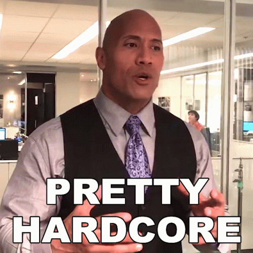 Bald Man In Vest And Tie Says Pretty Hardcore GIF
