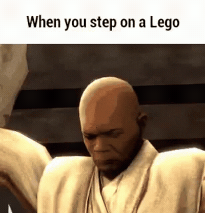 Bald Man In White Robe Next To Lego GIF