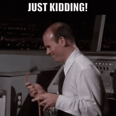 Bald Man In White Shirt Holding Hose And Smiling GIF