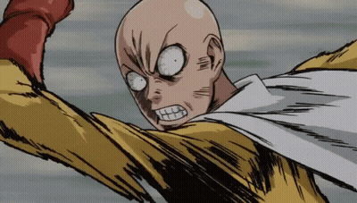 Bald Man In Yellow And White Superhero Costume Making Funny Face GIF
