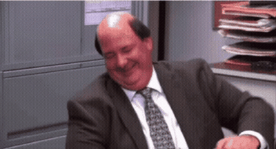 Bald Man Laughing In Suit And Tie GIF
