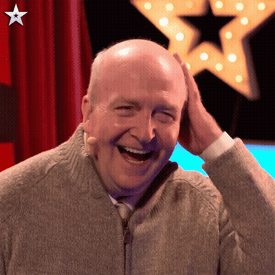 Bald Man Laughing Star Red Curtain GIF