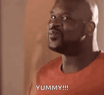 Bald Man Making Funny Face Saying Yummy GIF