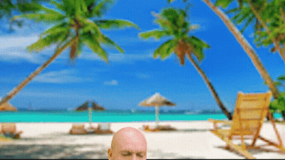 Bald Man On Beach Eyes Closed GIF