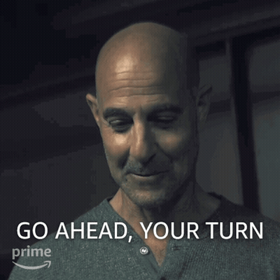 Bald Man Saying Go Ahead Your Turn In Front Of Amazon Logo GIF