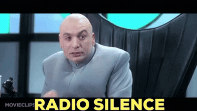 Bald Man Sitting In Chair Saying Radio Silence GIF