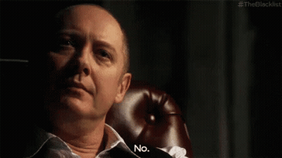 Bald Man Sitting In Red Leather Chair Saying No GIF