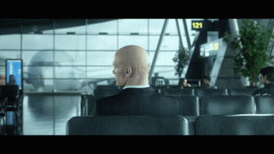 Bald Man Sitting In Waiting Area Sign 121 GIF
