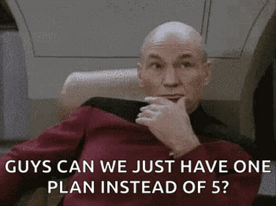 Bald Man Sitting With Hand On Chin Says Guys Can We Just Have One Plan Instead Of 5 GIF