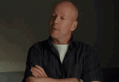 Bald Man Smiling At Watch GIF