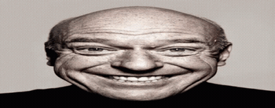 Bald Man Smiling In Black Shirt GIF