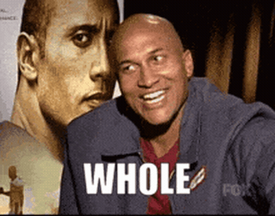 Bald Man Smiling In Front Of Dwayne Johnson With Word Whole GIF