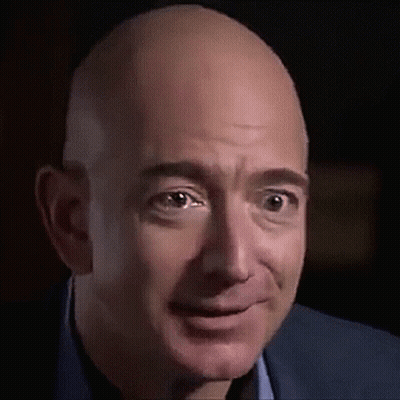 Bald Man Smiling In Suit GIF