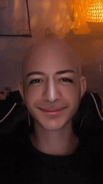 Bald Man Smiling With Nose Ring GIF