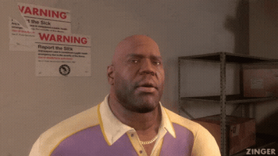 Bald Man Standing In Front Of Warning Sign GIF