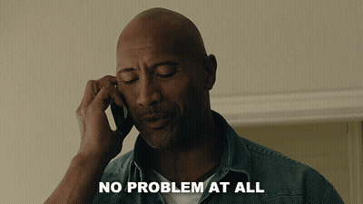 Bald Man Talking On Cell Phone Saying No Problem At All GIF