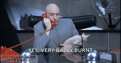 Bald Man Talking On Red Telephone Holding Cat GIF