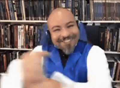 Bald Man Wearing Headphones Smiling GIF