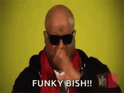 Bald Man Wearing Sunglasses And Red Scarf Making Funny Face GIF