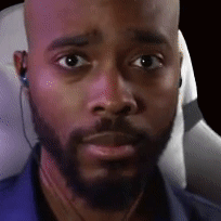 Bald Man With Beard And Earbuds GIF
