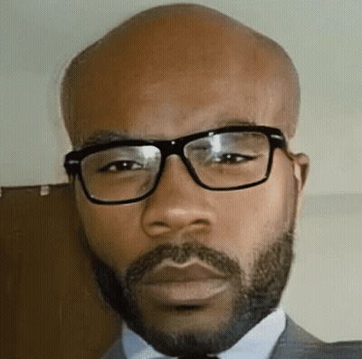 Bald Man With Beard And Glasses In Suit And Tie GIF
