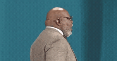 Bald Man With Beard And Glasses In Suit And Tie GIF