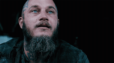 Bald Man With Beard And Tattoos Covering Face GIF