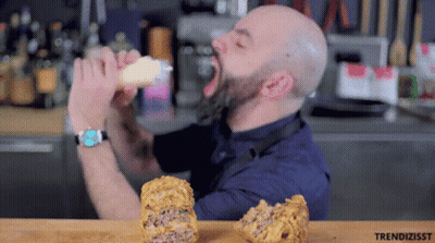 Bald Man With Beard Eating Food GIF