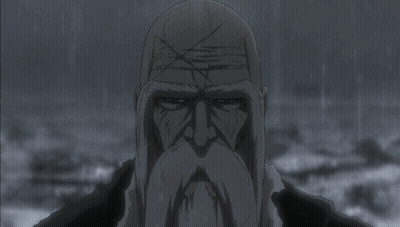 Bald Man With Beard Looking At Camera In Rain GIF